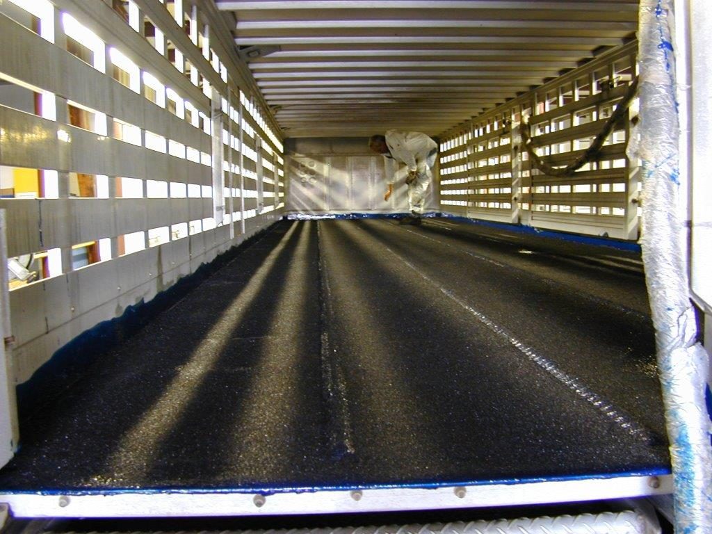Travel trailer waterproofed with polyurea coating